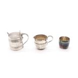 A collection of silver to include;  A Victorian silver drum mustard pot, with ribbed body and gilt