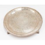 A Victorian silver salver, egg-and-dart border, the centre with band of anthemions and floral scroll