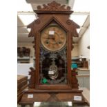 An early 20th century American 'Cookie'/ 'Gingerbread' clock, two treen trinket boxes and a table