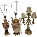 Three gilt table lamps, mid 20th Century, one four branch converted candelabra, a hand painted