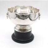 An Elizabeth II silver two handled punch / rose bowl, wavy gadroon border, with twin lion's mask and