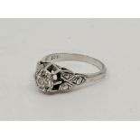 An 18ct. white gold single stone diamond ring, set round brilliant cut diamond (EDW 0.50 carats),