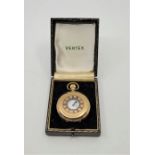 A Vertex Revue 9ct. gold half hunter pocket watch, crown wind, having signed white enamel Roman