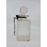 A Betjemann's patent locking silver mounted cut glass decanter, by George Betjemann & Sons, London