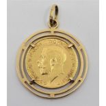 A George V 1912 gold sovereign, mounted within 18ct. gold pendant mount, diameter 30mm. (total
