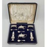 A cased silver six piece cruet, by Mappin & Webb Ltd, Birmingham 1937, comprising two each