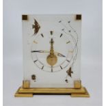 A Jaeger-LeCoultre Marina Atmos mantle clock, having perspex side panels, signed to the front,