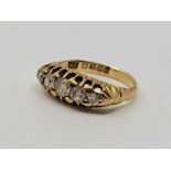 A Edwardian 18ct. yellow gold five stone diamond ring, London 1904, set five graduated old-cut