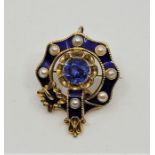 A fine yellow metal, blue cloisonné enamel, pearl and sapphire set pendant/brooch, fashioned as a