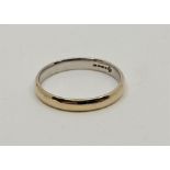 An 18ct. white gold band, assayed London 2000, size UK R+. (3.3g)