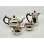 A three piece silver tea service, all by S W Smith & Co, the teapot London 1912, the jug and twin