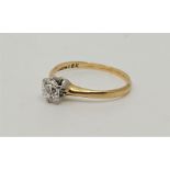 An 18ct. gold diamond solitaire ring, set round brilliant-cut diamond (EDW 0.40 carats), size UK