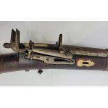 A 19th century flintlock Jezail long rifle, having steel barrel with rear sight, banded dark wood
