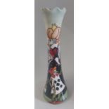 A boxed trial The Queen of Hearts vase, made by Moorcroft. Decorated with characters from Alison