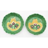 A pair of English 18th Century moulded pottery dessert dishes, circa 1750, decorated with florets,