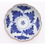 A Japanese Arita blue and white porcelain flower shaped bowl, 18th/19th Century, painted with