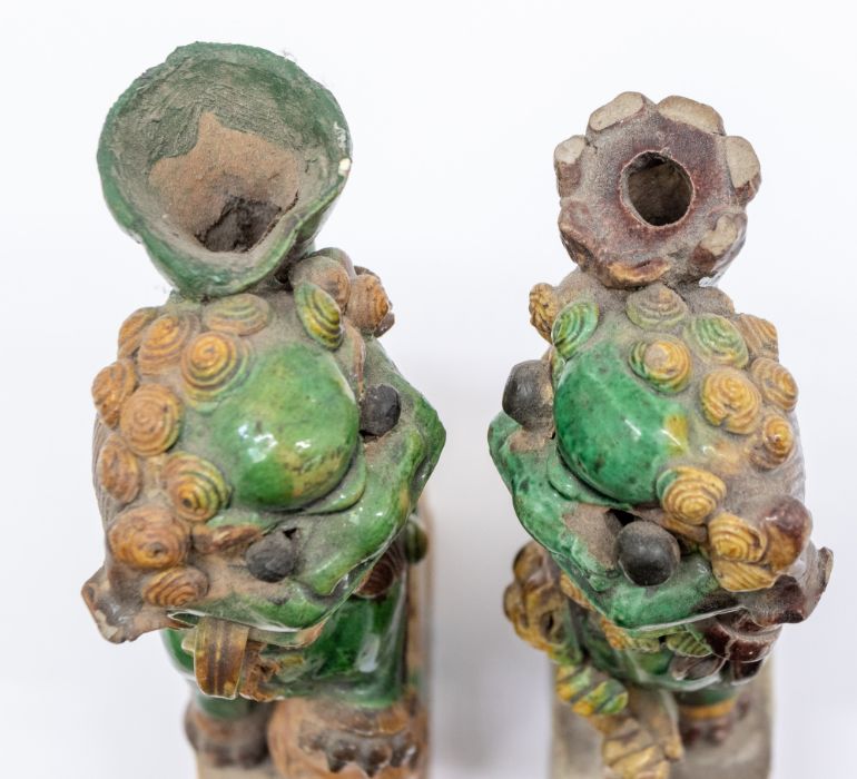 A pair of Chinese egg and spinach glazed Dogs of Fo incense (jos stick) holders, Qing Dynasty ( - Image 4 of 4