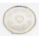 A George III large silver salver, ribbon tied and beaded raised border, the reserve engraved with