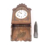 Black Forest hook and spike style verge wall clock on a single train movement striking on a bell.