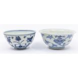 A Chinese Ming Dynasty blue and white porcelain flying birds bowl, decorated with aquatic flowers