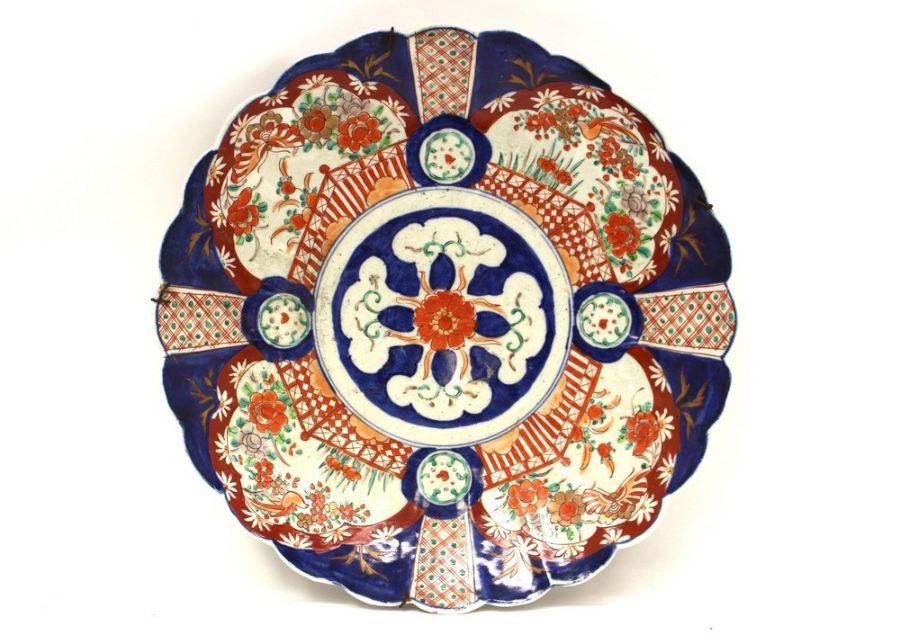 A 19th Century large Chinese Imari charger of floral design, blue and white transfer to back, approx