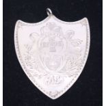 A George III silver shield shaped probably Anglo-Scottish Society medal probably Masonic, bright-cut