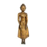 A Thai late 19th / early 20th Century gilded lead standing figure of Buddha, size 58cm high  Further