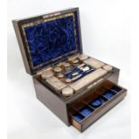 A Victorian rosewood travelling case, with vacant brass cartouche and key plate, fitted blue