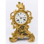 M. Rango of Paris France, mantel clock in a gilded cast metal case lovely castings of swages and