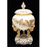 A Royal China Works Worcester pot pourri and cover, circular body painted with finches perched on