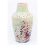 An early 20th Century Ruskin pottery high fired stoneware vase, of shouldered form the cream