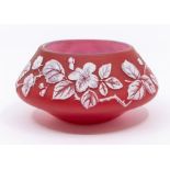 A Stourbridge style ruby cameo glass tapering case, decorated with rose hips, the base 12cm diam