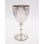 A Victorian silver large wine goblet, engraved lambrequin decoration to upper section, later