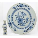A Chinese Nanking blue and white plate, painted with flowering branches and a Peony. Harrods