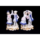 A pair of early 20th Century Continental probably German porcelain figures modelled as 18th
