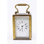 A French miniature brass metal mounted carriage clock, 1" x 2" white enamel dial with Roman