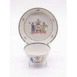 A Chinese Export porcelain Armorial tea bowl and saucer, circa 1780, each piece painted with two