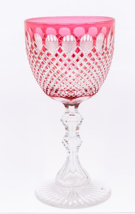 A large Bohemian ruby and clear glass hob nail cut goblet, on knopped stem, the base with astragal