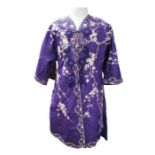A late 1930s/40s rich purple kimono with a cherry blossom decoration in pale pink and cream on a