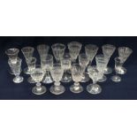 A collection of 18th and 19th Century wine glasses, trumpet and ogee bowls, facet cut or etched