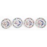 A set of four Chinese Ming Dynasty wucai porcelain dragon and phoenix small dishes, each with six