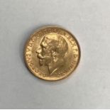 An Edwardian gold sovereign, 1912, 8 grams, in fitted case (1)
