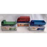 Dinky: A collection of three boxed Dinky Toys Guy Trucks, to comprise: Slumberland Van 514, some