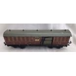 Bassett Lowke: An unboxed, O Gauge, Bassett Lowke, Mail Coach. Rare item in used but good condition.