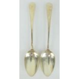 Pair of William IV silver serving spoons with arm and cutlass crest. Hallmarked London 1837