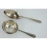 Silver tea infuser hallmarked for Birmingham 1930 and a silver tea strainer (A/F)