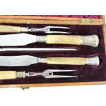 Victorian five piece carving set with silver mounted antler handles in fitted oak case.