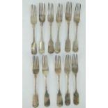 Eleven 19th century silver fiddle pattern table forks, various makers. All fully hallmarked