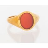 An 18ct gold Carnelian set signet ring. Size V. Approximate gross weight 7.5 grams.