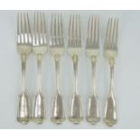 Six silver fiddle and thread pattern table forks with arm and dagger crests. Hallmarked London 1851,